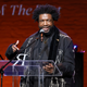 NEW YORK, NEW YORK - DECEMBER 08: Questlove speaks onstage during the 13th Annual Root 100 Gala at The Apollo Theater on December 08, 2022 in New York City.